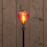Montgolfière solaire sur piquet à effet flamme 12 LED – Rose 57 cm